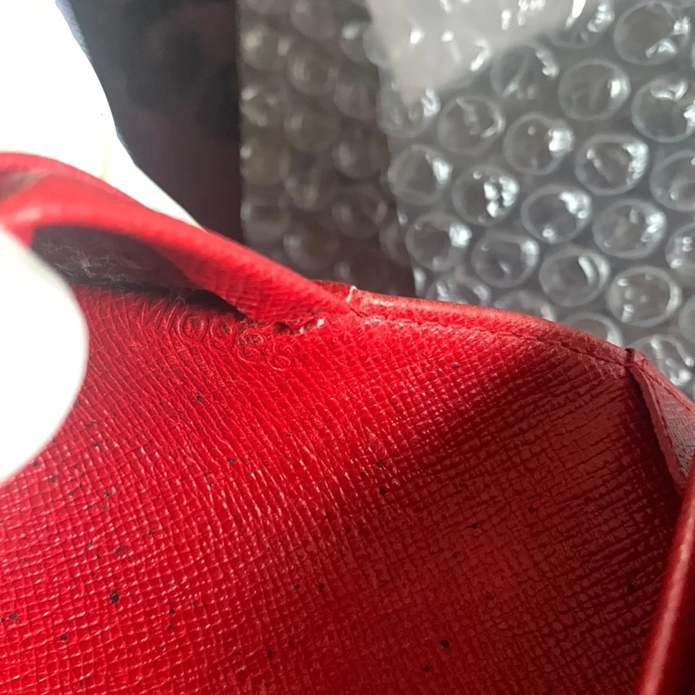 Louis Vuitton Porte tresor Epi leather wallet